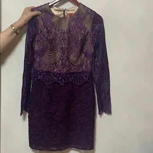 Monique Lhuillier purple midi dress.